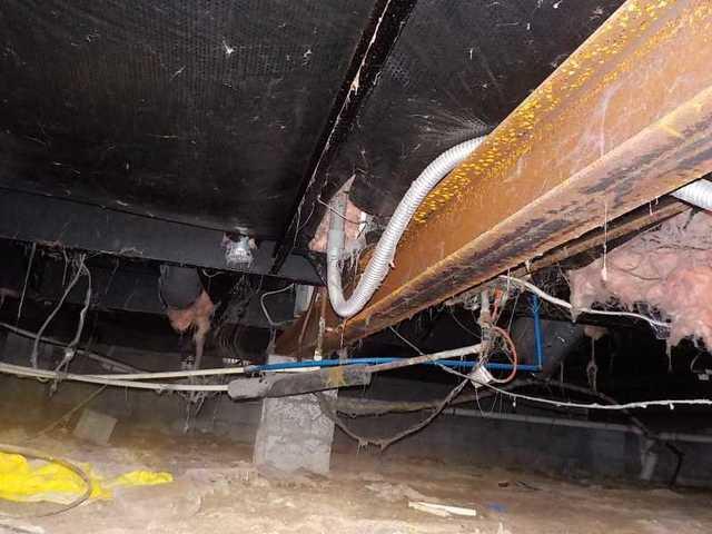 Corroded Beam in Wet Crawl Space
