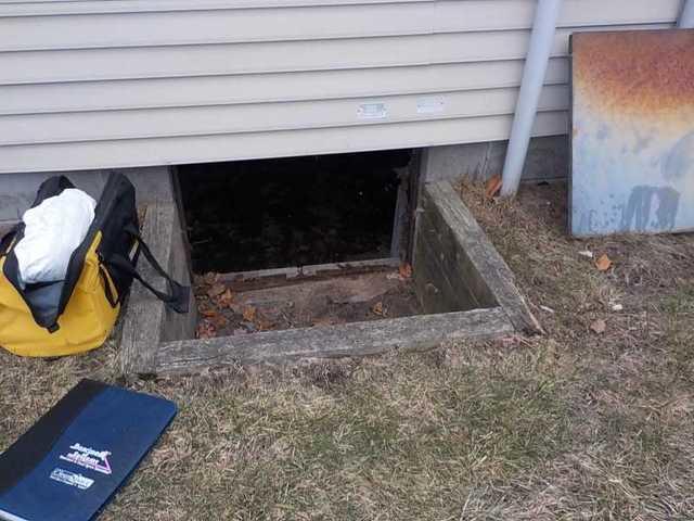 The existing door wasn't air or water tight, leaving the crawl space (and home) exposed to the elements.