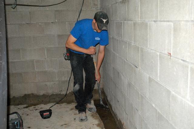 <p>The crew makes sure all the concrete they have to jackhammer away is removed before placing the WaterGuard down.</p>