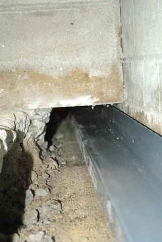 <p>The WaterGuard drainage system fits easily under basement walls to entirely wrap around the perimeter of the basement.</p>