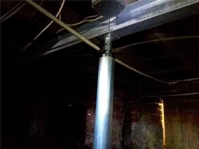 PushPiers and additional steel braces were used to level and support the house.