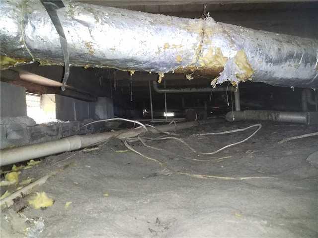 Condensation was appearing on ductwork and piping, and insulation was starting to fall from the ceiling because it had become laden with moisture.