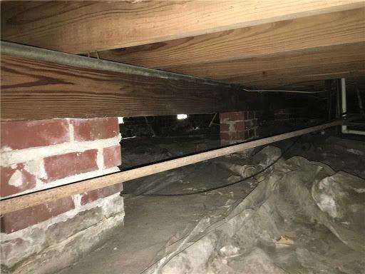 Settled piers in crawl space