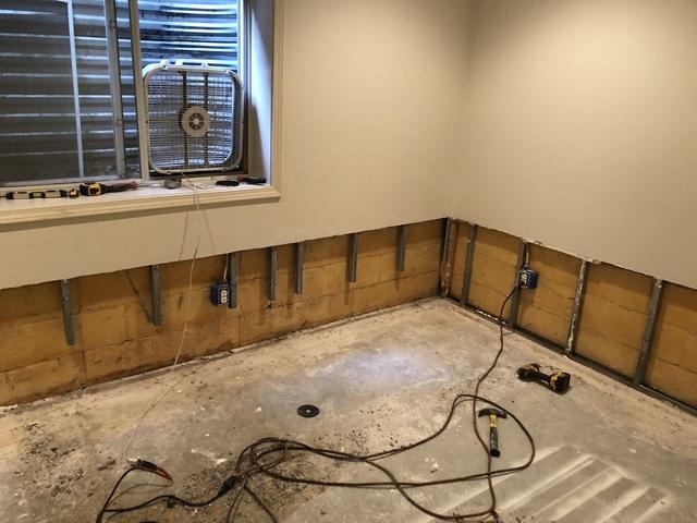 <p>We cut away a portion of the drywall to expose the area of the wall where the leaking is occurring. This is where we will install our DryTrak pipe that will drain into the Sump Pump.</p>