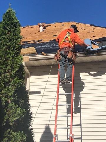 <p>After the old roof was torn off My-Pros had to detach & reset the toe brackets before installing the new ice & water shield protection. In this picture you will see that Chad is installing the ice/water protection on the edge before nailing the toe boards back in place.</p>
