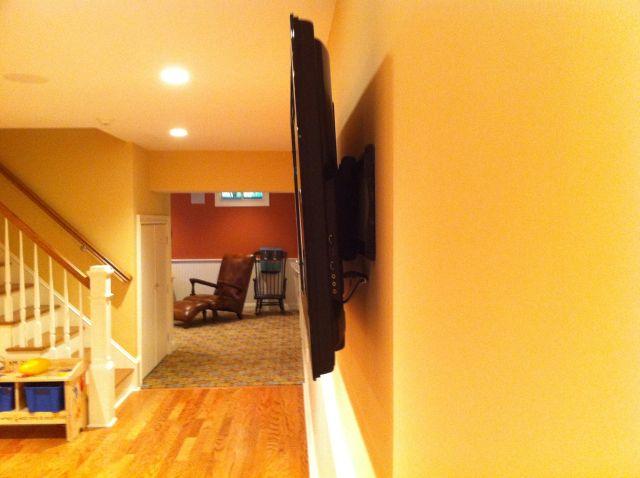 Close up of flat screen installation on wall in billiard room
