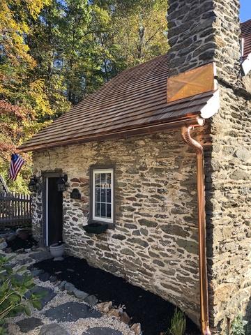 Middle Creek Roofing Roof Flashing Photo Album Copper Accents On This Beautiful Stone Home