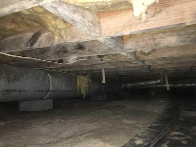 Before encapsulating the crawl space, the joists and subfloor absorbed a lot of the moisture beneath the home.