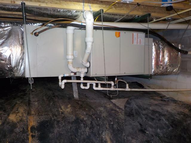 The heating and cooling unit was under the home. The unit would constantly battle the same extreme temperatures as the crawl space, not a very energy efficient environment.