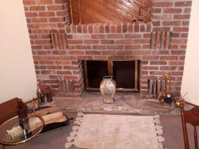 Cosy Fireplace in a Leaky Basement