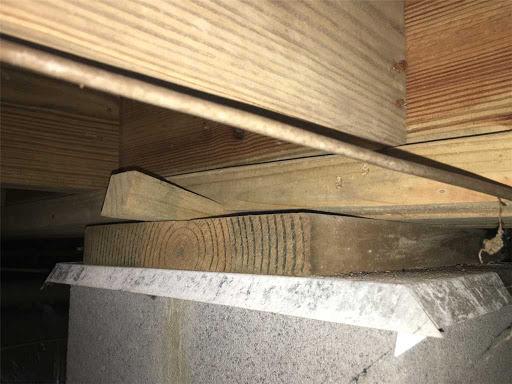 This sagging floor was not properly supported by the piers underneath the home.