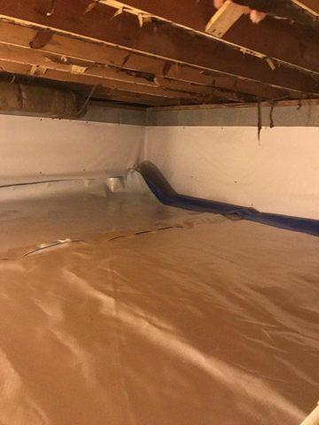 The floor of the crawl space is being put in.