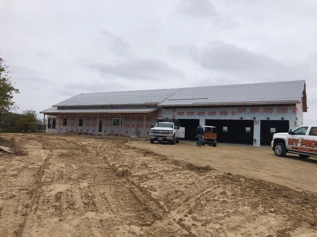 <p>This picture shows the front of the new construction home from the ground view.</p>