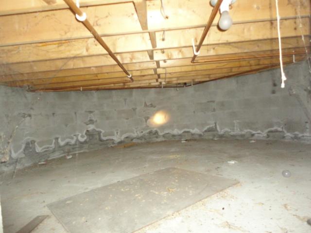 <p>The crawlspace of this Pomfret Center, CT home was wet and had problems with flooding, seen in the staining on the floor and walls. We installed our CleanSpace crawl space encapsulation system to seal off the area and keep moisture out. The durable plastic liner prevents moisture and odors from entering the home, and it comes with a 25 year warranty against rips and tears. The sealed crawlspace is now dry and protected against further moisture damage.</p>