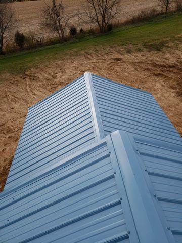 <p>The new roof is installed after 3.5 days of hard work. We are proud to say this metal roof is American Steel & American Made.</p>