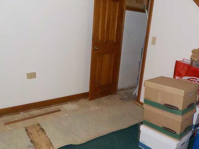 This basement was finished, so it took a while to realize there was a water issue. When they cut away the carpet, our customers could see staining indicating water damage.