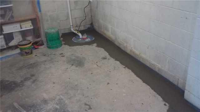 Once the system is in place and tied into the sump pump, we pour new concrete to protect the system and restore the floor.