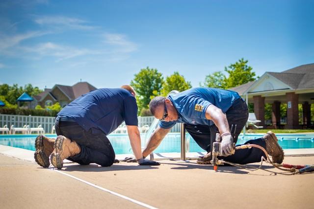 Our team drilled small holes into each sinking slab. Using special equipment, they injected the PolyLevel foam beneath the sinking slab raising it back towards its desired level.