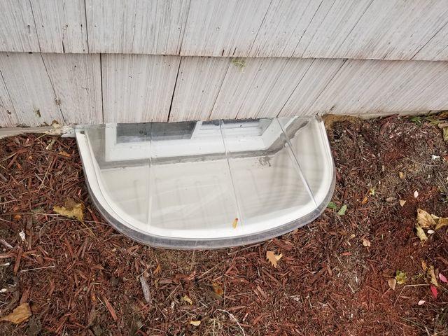 EverLast window and SunHouse window well have been installed. These dry basement products will not decay when exposed to the elements, and they maximize the beauty of the basement space.