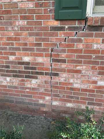 Cracks in exterior walls are signs of foundation settlement