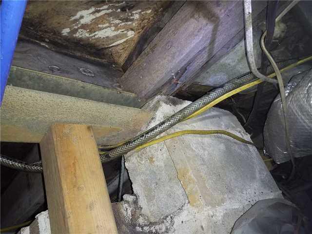 Underneath the kitchen the subfloor was completely rotted and in need of replacement.