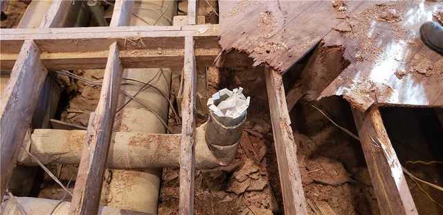 Most of the joists were rotted or breaking apart and needed to be replaced to support the subfloor on top.