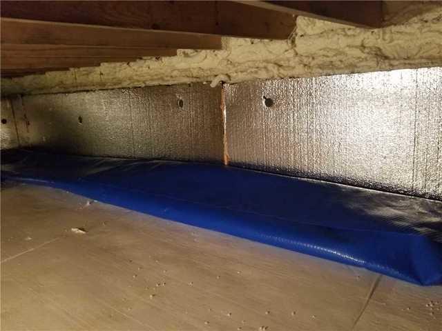 the tiny particles in our SilverGlo wall insulation panels actually reflect heat, containing in the crawl space area.