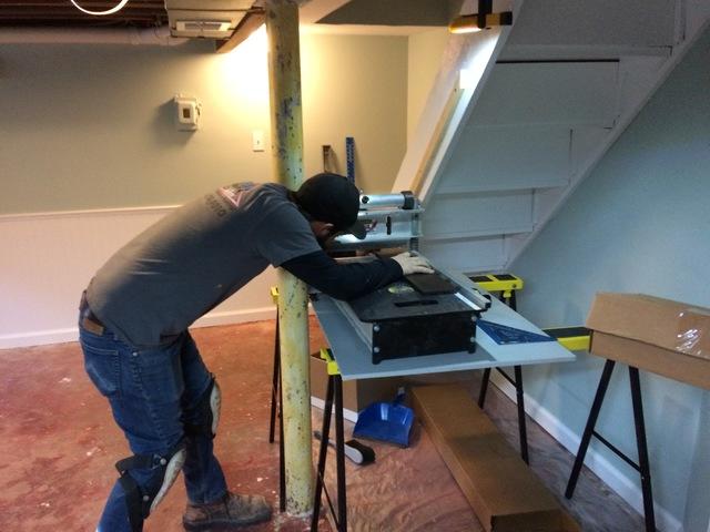 Tim Preparing the Plank Flooring