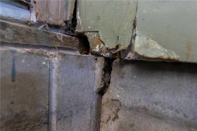 Cracks forming from settlement.