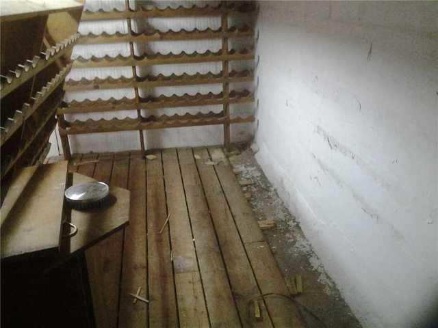 <p>The floor along the wall of the wine cellar is prepared for WaterGuard installation.</p>