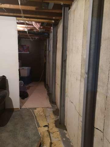 Braces Tightened to Straighten Wall