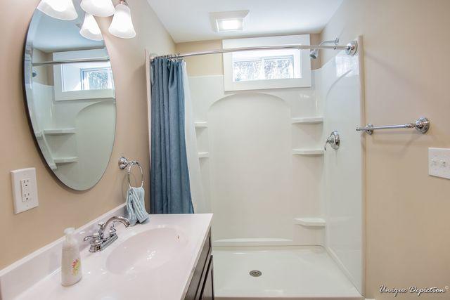 Bathroom addition in a Windham, NH finished basement