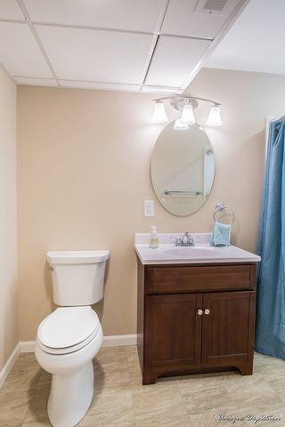 Bathroom addition in a Windham, NH finished basement