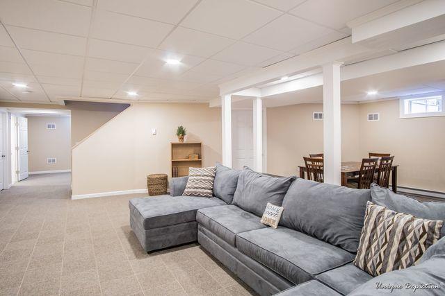 Finished sitting area in Windham, NH finished basement