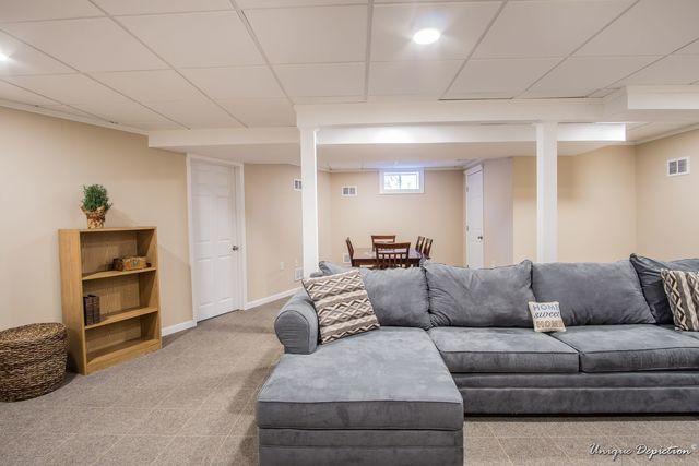 Finished sitting area in Windham, NH finished basement