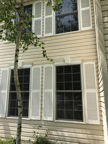 Here's a shot of the elegant new double hung windows with grilles.