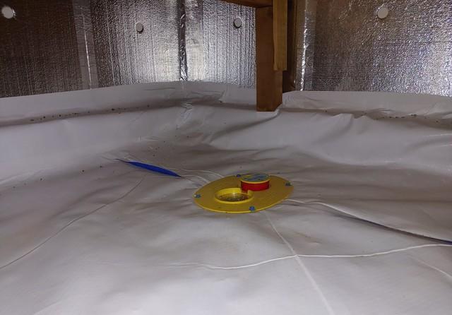 Our crew is able to lay down the Cleanspace vapor barrier once the SilverGlo is installed to create a waterproof seal. The smartdrain is shown here.