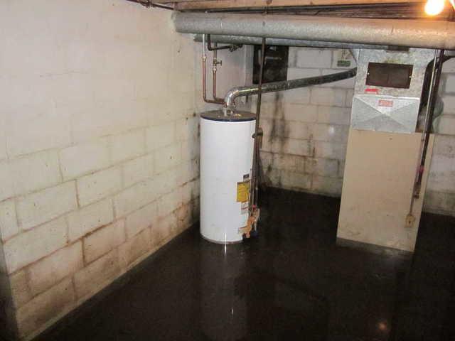 <p>Foundation degrading in this home has caused large foundation wall cracks and has lead to severe basement flooding. It's also important to realize that tank-style hot water heaters are prone to leaking from gradual corrosion of metals and are a major hazard for basement environments.</p>