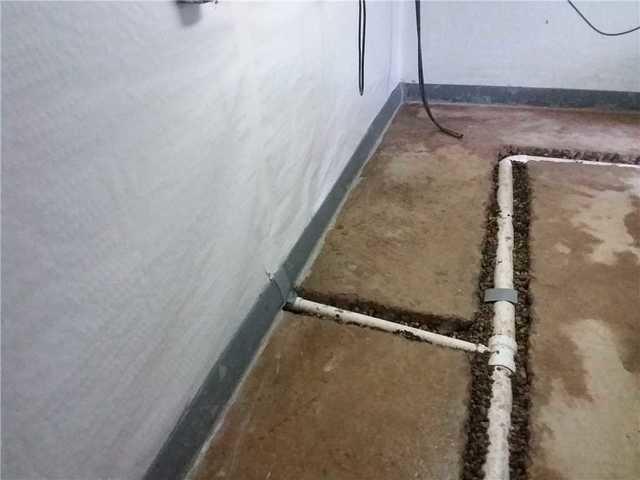 DryTak® Baseboard Drain Pipe