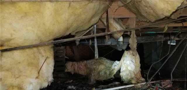 Falling, soggy insulation hid some of the problems in this crawl space.