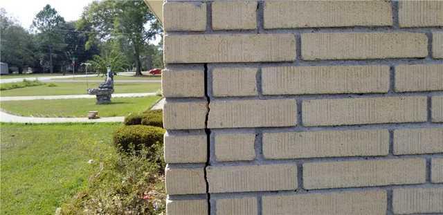 Cracks appeared as the foundation sunk on this home.