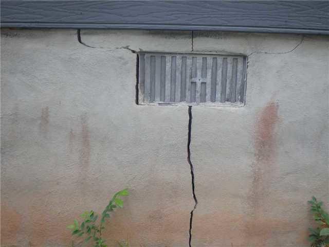 Cracks appeared as the foundation sunk