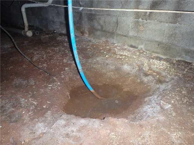 Pooling water was an issue in this crawl space