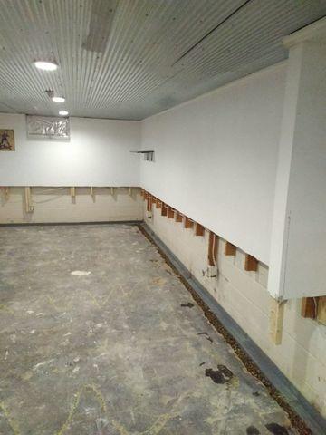 American Waterworks has removed 32" of sheetrock and installed the WaterGuard drainage system.