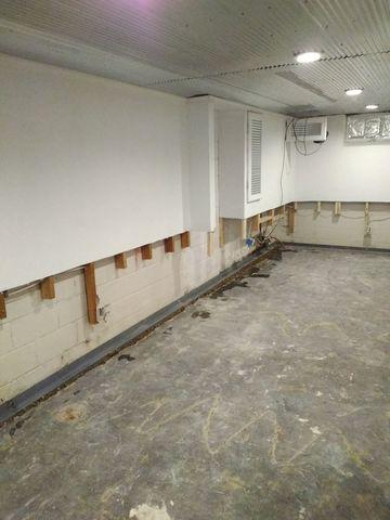 American Waterworks has removed 32" of sheetrock and installed the WaterGuard drainage system.