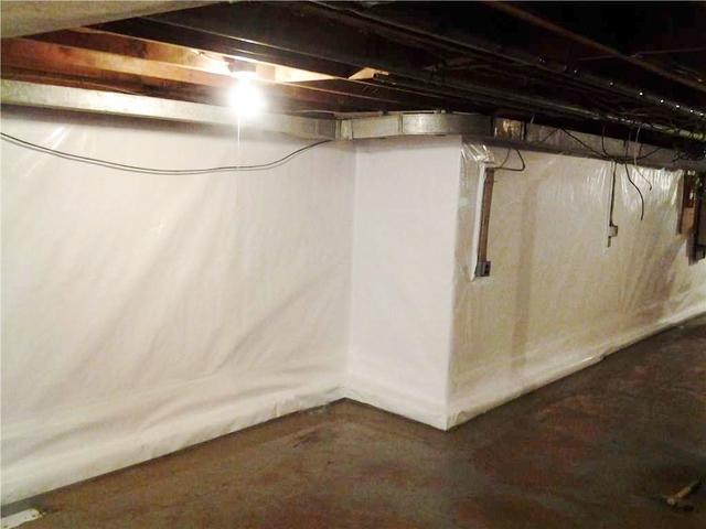 <p>The CleanSpace Wall System brightens the basement walls while WaterGuard is installed along the perimeter of the floor to protect against any water leaking into the basement.</p>