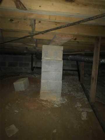 The crawl space pillars were sinking into the ground, the subfloor sunk and the drywall tore above the door frame.