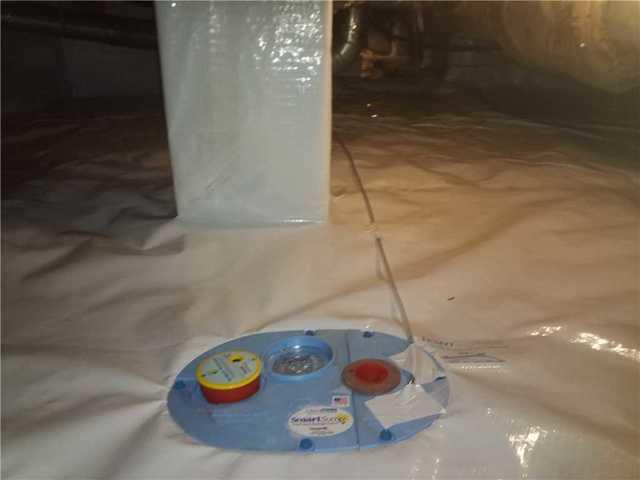 The SmartDrain allows water collected from the crawl space to return to the earth
