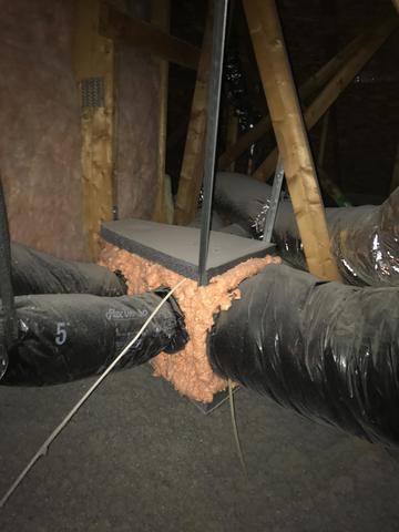 Now the supply duct is completely encapsulated and protected from the extreme temperatures in the attic.