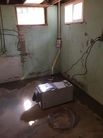 We utilized this corner for the sump pump and the dehumidifier.